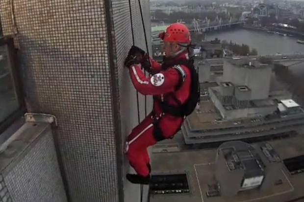 Phillip Schofield descend down London tower block for charityimage