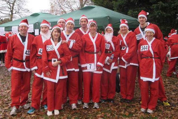 Hundreds of Santas join forces for south London charity runimage