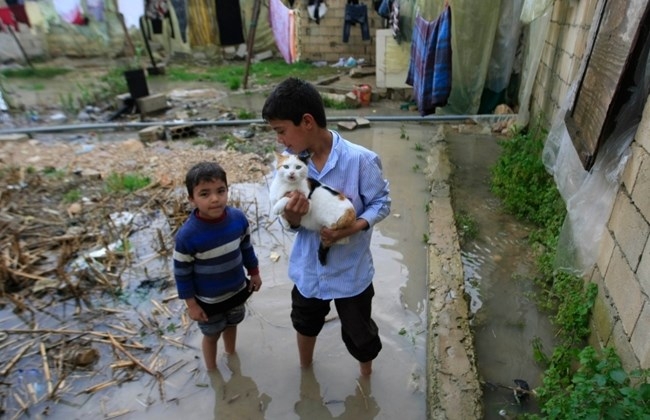 Heavy rain floods Syrian refugee tents in south Lebanonimage