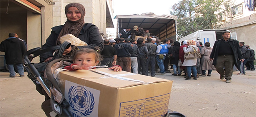 Humanitarian Supplies From UN Reach To Syrians Who In Needimage