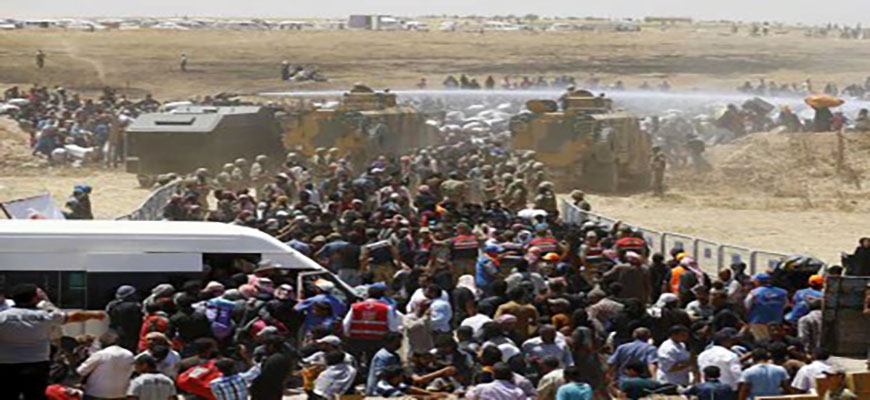 2000 additional refugees crossing into Turkey due to the fighting in northern Syriaimage
