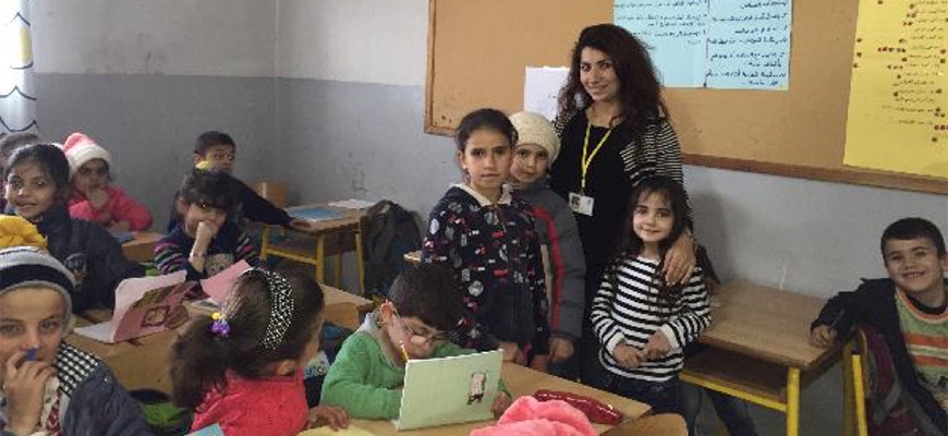 Away from war, Syrian children are going back to school in Lebanonimage